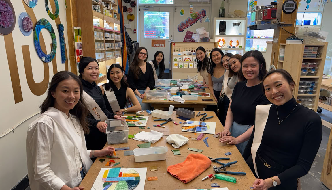 adults in fused glass workshop